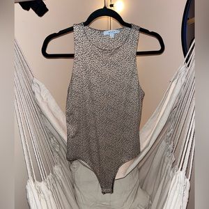 Only worn like two times. Medium cheetah print body suit